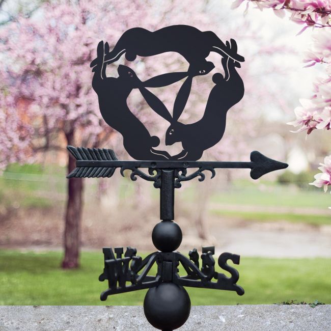 Three Hares Weathervane in Situ by a Blossom Tree Three Hares Weathervane in Situ by a Blossom Tree