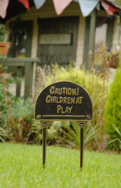 Solid brass & black "Caution Children at Play" lawn sign Solid brass & black "Caution Children at Play" lawn sign