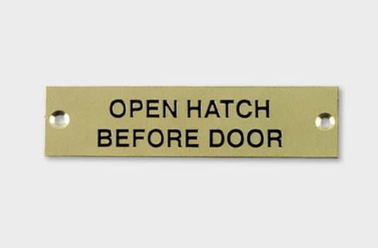 Solid Brass Plaque With Black Lettering Label "Open Hatch Before Door"