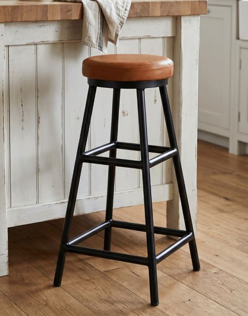 Iron & Brown Goat Leather Backless Bar Stool in Situ
