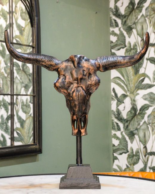 "Montana" Cast Aluminium Long Horn Skull Positioned on a Table Inside a Home