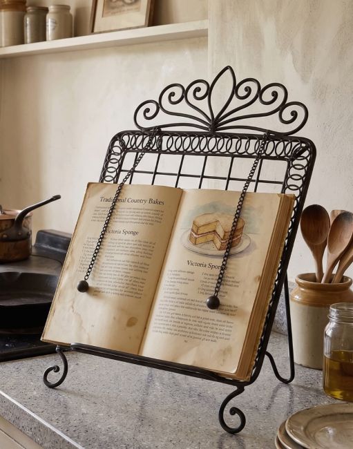 A Black Cook Book Stand on a Kitchen Worktop Holding a Recipe Book Open - Digital Illustration A Black Cook Book Stand on a Kitchen Worktop Holding a Recipe Book Open - Digital Illustration