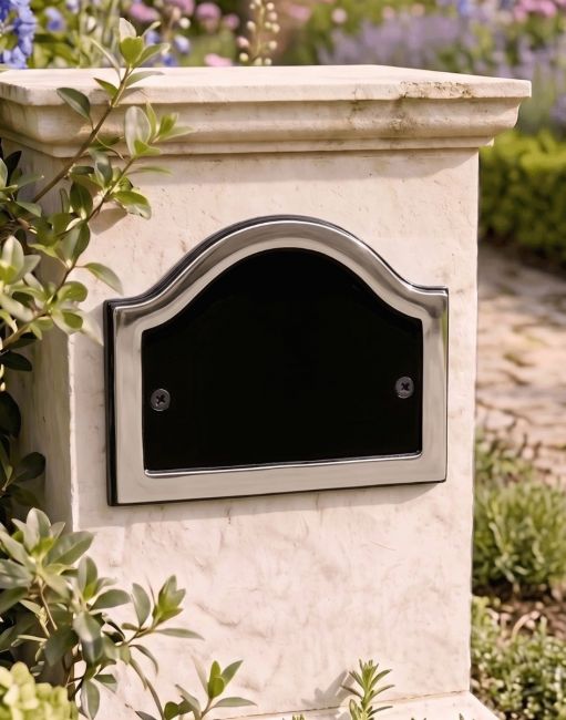 A Blank Arched House Number Plaque in a Black & Chrome Finish Mounted on a Garden Pillar Driveway - Digital Illustration A Blank Arched House Number Plaque in a Black & Chrome Finish Mounted on a Garden Pillar Driveway - Digital Illustration