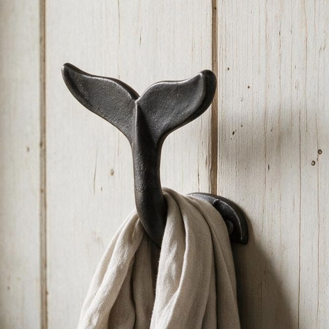 Whale Tail Cast Iron Coat & Hat Hook Mounted on a Wooden Wall Whale Tail Cast Iron Coat & Hat Hook Mounted on a Wooden Wall