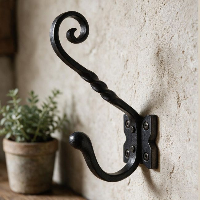 A Close up View of the Black "Lincoln" Coat Hook On a Wall in a Country Home - Digital Illustration A Close up View of the Black "Lincoln" Coat Hook On a Wall in a Country Home - Digital Illustration