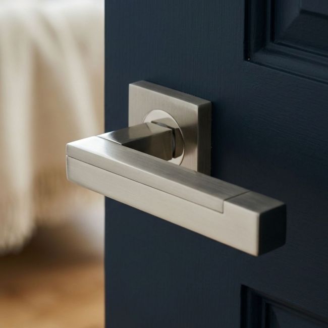 The Satin and Polished Nickel Square Rose Door Handles - Modern Lever Pair on a White Background