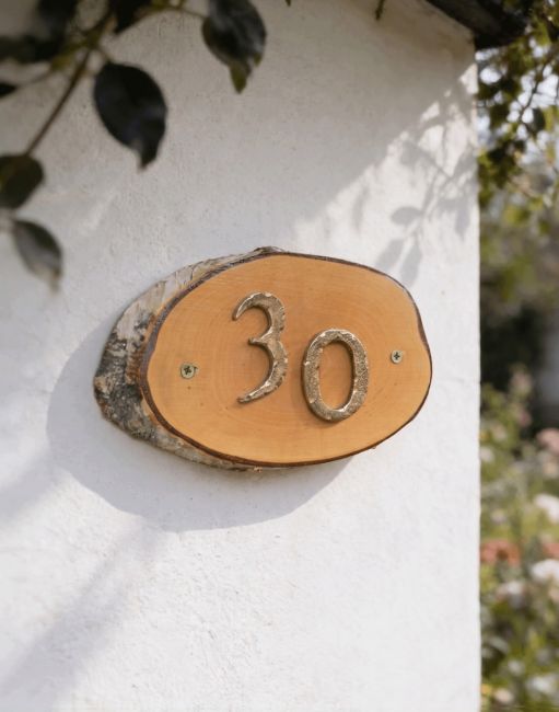 A Number 30 Natural Hard Wood Rustic House Number Sign Mounted on a Sunny White Cottage Wall - Digital Illustration A Number 30 Natural Hard Wood Rustic House Number Sign Mounted on a Sunny White Cottage Wall - Digital Illustration