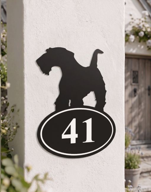 A Number 41 Customisable Airedale Terrier House Number Sign Mounted on a Sunny White Pillar in Front of a Country Home - Digital Illustration A Number 41 Customisable Airedale Terrier House Number Sign Mounted on a Sunny White Pillar in Front of a Country Home - Digital Illustration