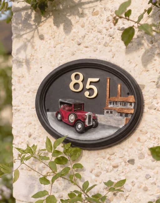 A Number 85 Hand Painted Tin Lizzy Vintage Car House Sign Mounted on a Textured Cottage Garden Wall - Digital Illustration