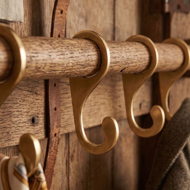 A Set of Round Clothes Rail Hook on a Wooden Rail in a Country Home - Digital Illustration A Set of Round Clothes Rail Hook on a Wooden Rail in a Country Home - Digital Illustration