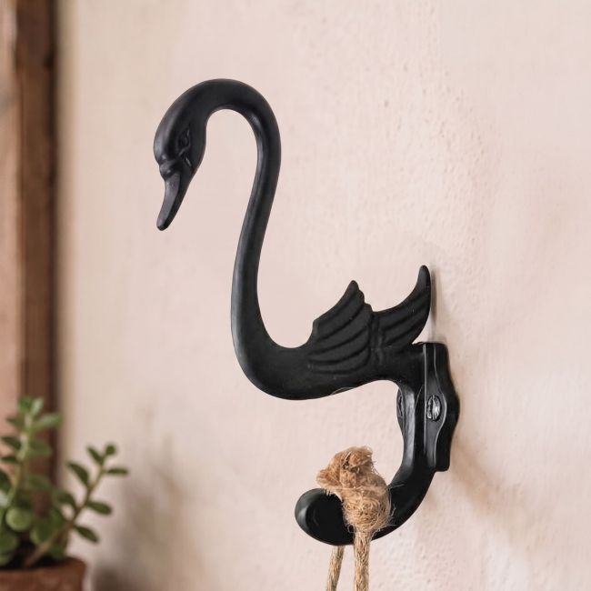 Black Swan Coat Hook on a Shabby Chic Painted Surface Black Swan Coat Hook on a Shabby Chic Painted Surface