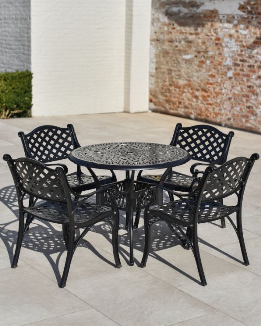 Aged Black "Farleigh" Four Seater Furniture Set in Situ on an Outdoor Garden Patio Aged Black "Farleigh" Four Seater Furniture Set in Situ on an Outdoor Garden Patio