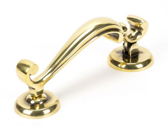 Aged Brass Traditional Doctors Door Knocker Close Up Aged Brass Traditional Doctors Door Knocker Close Up