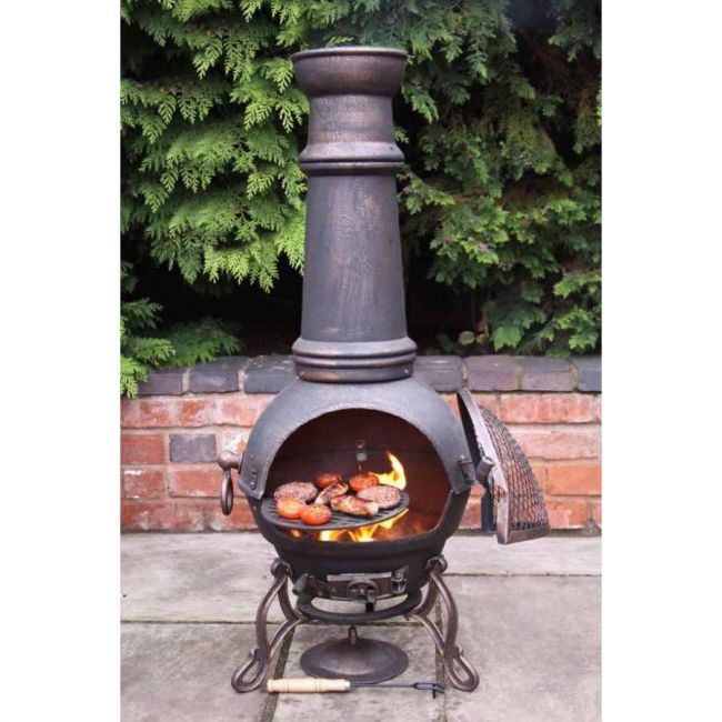 Antique Bronze Cast Iron Chimenea in Situ Antique Bronze Cast Iron Chimenea in Situ