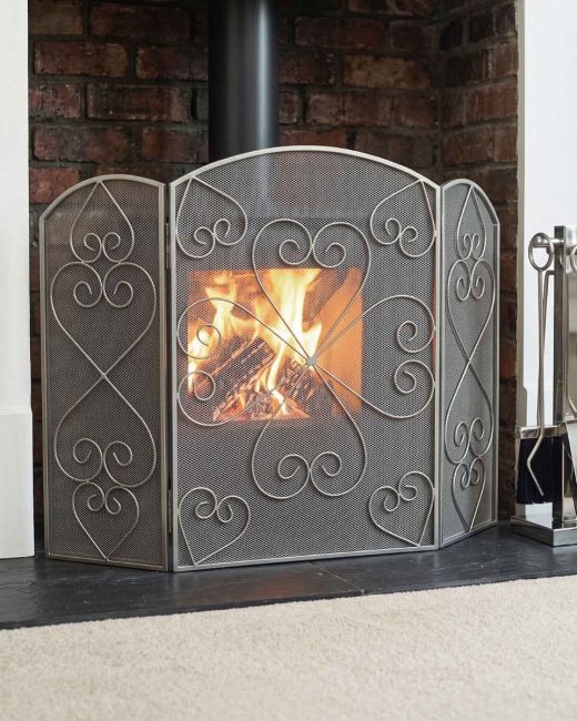 Antique Pewter Heart Design Three Fold Fireguard in Situ