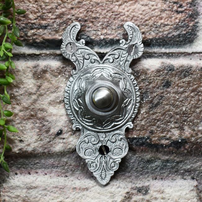 Satin Chrome Bell Push on Brick wall Satin Chrome Bell Push on Brick wall