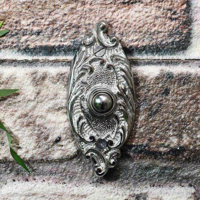 Oval ornate old fashioned door bell Oval ornate old fashioned door bell