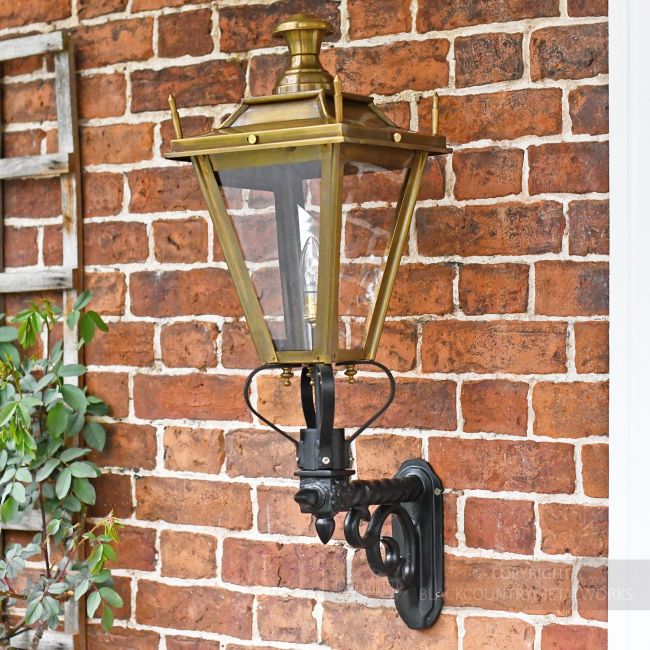 Antique Brass Dorchester exterior lantern on wall mounted bracket Antique Brass Dorchester exterior lantern on wall mounted bracket