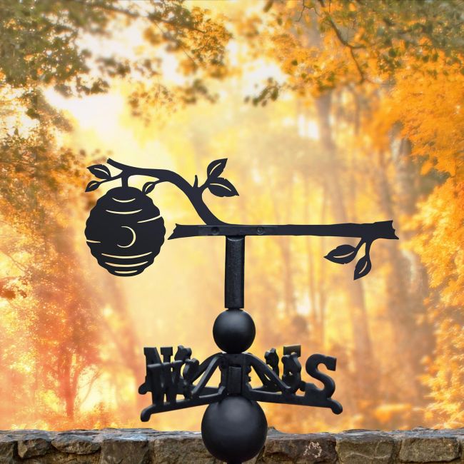 Beehive on Branch Weathervane in an Autumn Forest Beehive on Branch Weathervane in an Autumn Forest
