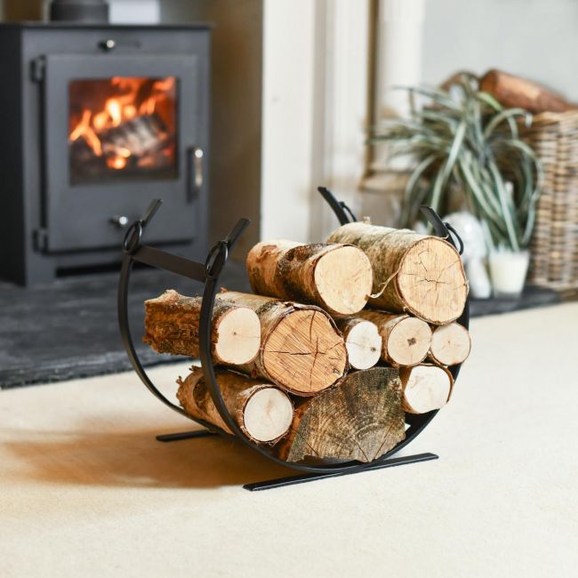 Black Blacksmith Curved Log Rack In Situ Black Blacksmith Curved Log Rack In Situ