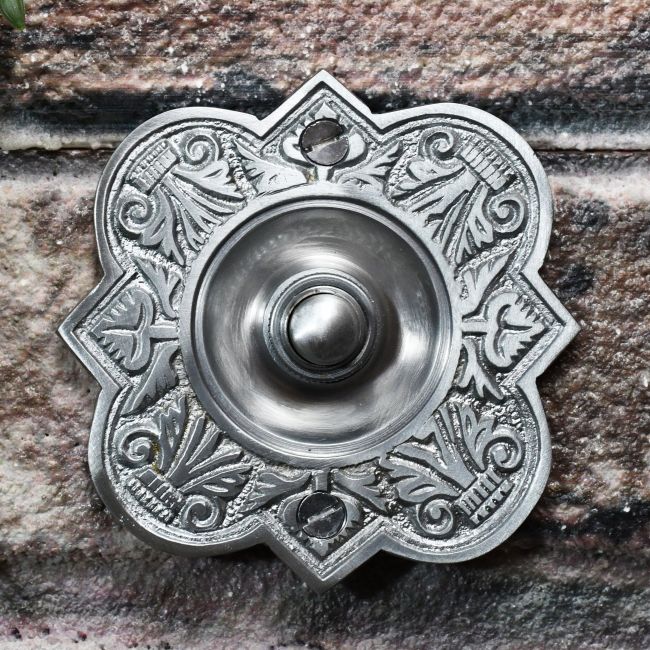 Satin Chrome Period Bell Push on Brick wall Satin Chrome Period Bell Push on Brick wall