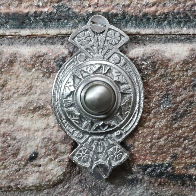 Brushed chrome ornate door bell push Brushed chrome ornate door bell push