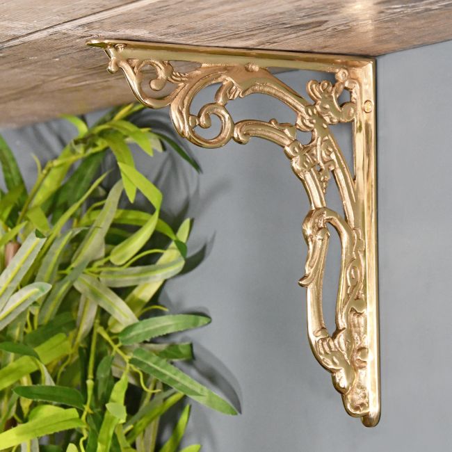 Ornate “Victorian Amalina” Scroll Bracket in a Polished Brass Finish Ornate “Victorian Amalina” Scroll Bracket in a Polished Brass Finish