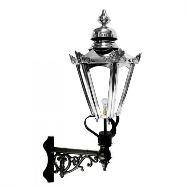 Stainless Steel Hexagonal Concordia Lantern on an Ornate Corner Bracket Stainless Steel Hexagonal Concordia Lantern on an Ornate Corner Bracket