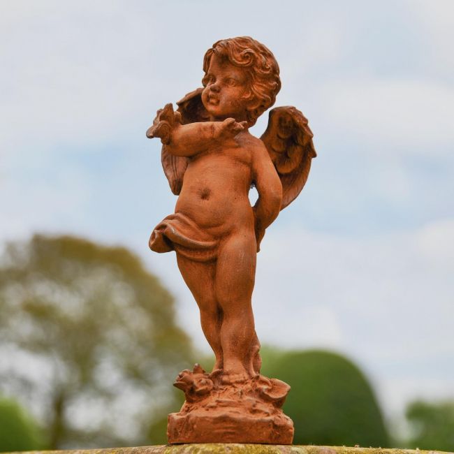 Rustic Cast Iron Winged Cherub with Butterfly Sculpture Rustic Cast Iron Winged Cherub with Butterfly Sculpture