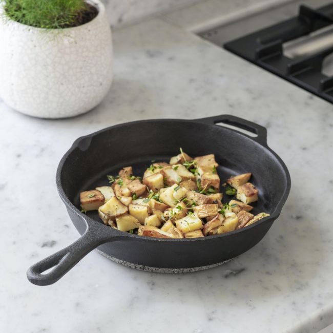 "Coalbrook" Cast Iron Frying Pan in Situ Being Used to Cook Food "Coalbrook" Cast Iron Frying Pan in Situ Being Used to Cook Food