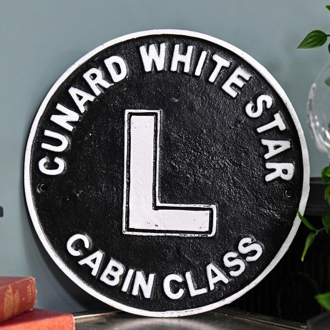 "Cunard White Star" Shipping Line Cast Iron Reproduction Sign in Situ Next to a Blue Wall "Cunard White Star" Shipping Line Cast Iron Reproduction Sign in Situ Next to a Blue Wall