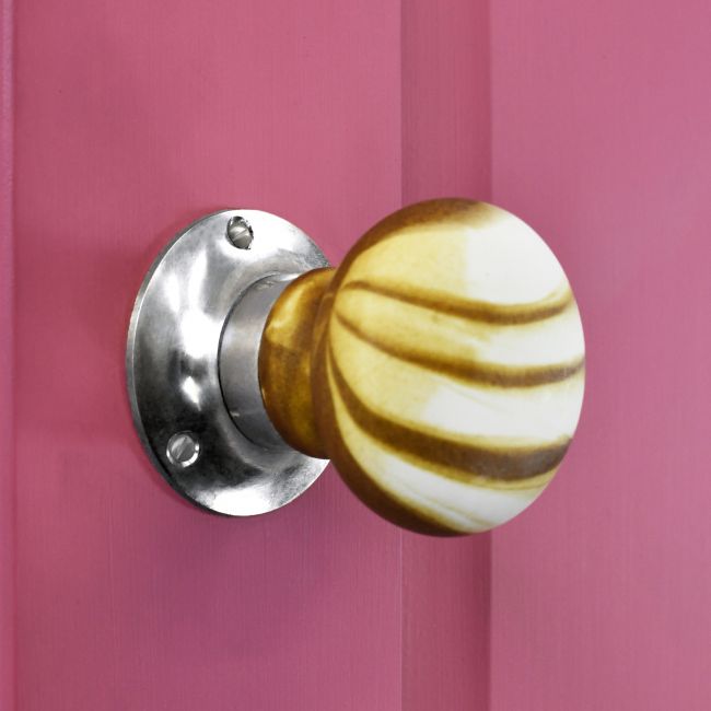 Stone Effect door knob with Bright chrome back plate on pink door