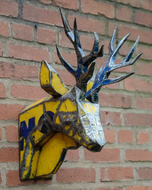 ‘Glint’ the Stag Head Mount Wall Art mounted on brick wall