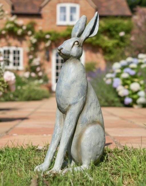 "Harry" the Hare Resin Garden Statue in Front of a Sunny Garden Patio "Harry" the Hare Resin Garden Statue in Front of a Sunny Garden Patio