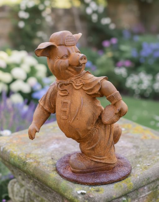 Digital illustration of Rustic Cast Iron "American Football Player" Pig Garden Sculpture positioned on a garden wall with a walled garden in the background