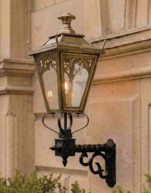 Digital Illustration of the 102 x 54cm Brass Gothic Wall Lantern on Royale Bracket Mounted on a Sandstone Building Entranceway
