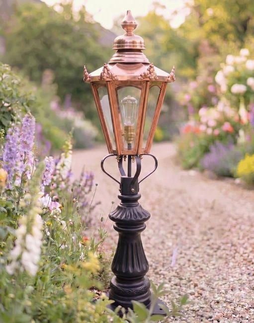 Digital Illustration of the 103cm Copper Hexagonal Fluted Patio & Driveway Light Positioned next to a Garden Drive Entrance