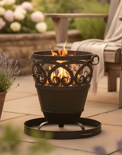 Digital Illustration of the 41cm Deluxe "Cradley" BBQ & Wood Burner Lit with Comfy Garden Furniture in the Background