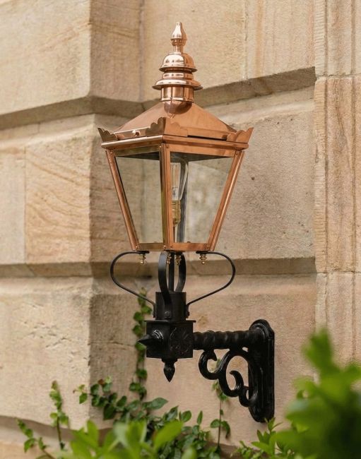 Digital Illustration of the 77 x 37cm Copper Harrogate Wall Lantern On a Royale Bracket Mounted on a Traditional Sandstone Brick Building Digital Illustration of the 77 x 37cm Copper Harrogate Wall Lantern On a Royale Bracket Mounted on a Traditional Sandstone Brick Building