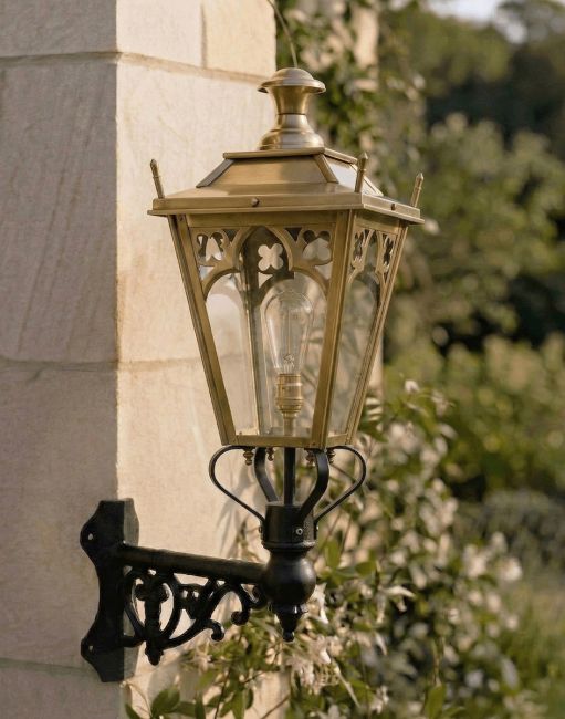 Digital Illustration of the 95 x 48cm Brass Gothic Wall Lantern on a Corner Bracket Mounted on a Sandstone Brick Sunny Garden Wall