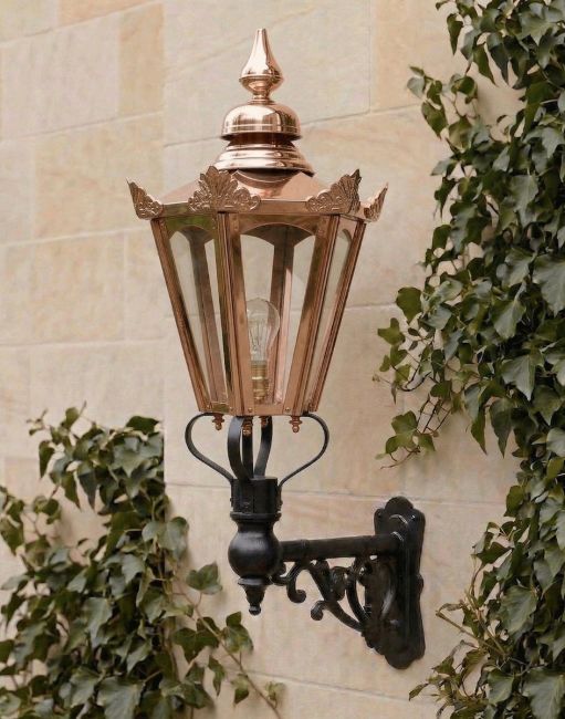 Digital Illustration of the 98 x 46cm Copper Hexagonal Wall Lantern on Ornate Bracket Mounted on a Sandstone Brick Garden Wall