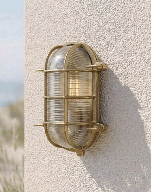 Digital Illustration of the Antique Brass Nautical "Bayside" Bulkhead Wall Light Mounted on a Cream Coloured Exterior Wall