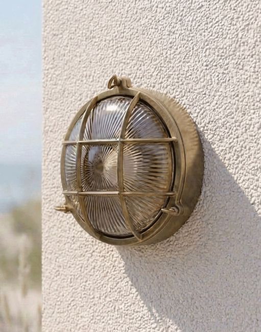 Digital Illustration of the Antique Brass Nautical "Bow" Wall Light Mounted on a White Coloured Exterior Wall