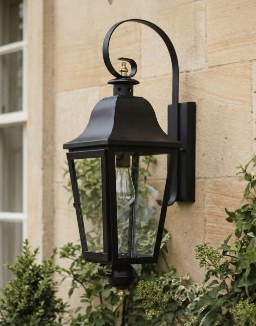 Digital Illustration of the Black "Cleobury" Wall Lantern Mounted on a Cream Coloured Exterior Wall