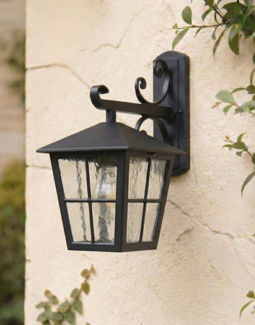 Digital Illustration of the Black "Moordale" Traditional Top Fix Wall Lantern on an Ornate Bracket Mounted on a Cream Coloured Exterior Wall