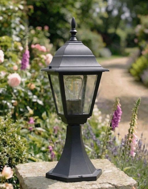 Digital Illustration of the Black "Chelsea" Traditional Pillar Light Mounted on a Stone Garden Pillar Surrounded by Flowers Digital Illustration of the Black "Chelsea" Traditional Pillar Light Mounted on a Stone Garden Pillar Surrounded by Flowers