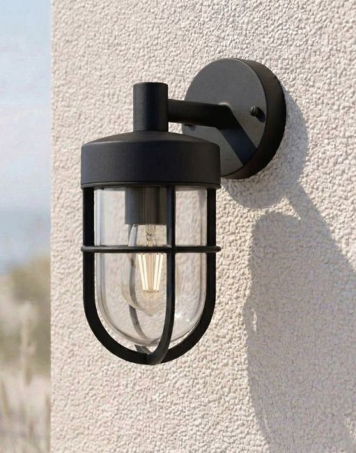 Digital Illustration of the Crofton Caged Garden Wall Light Mounted on a a White Coloured Coastal Building