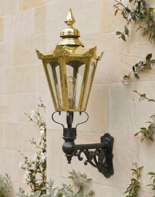 Digital Illustration of the Large Concordia Hexagonal Brass Lantern on a Capella Bracket Mounted on a Sunny Sandstone Brick Wall Digital Illustration of the Large Concordia Hexagonal Brass Lantern on a Capella Bracket Mounted on a Sunny Sandstone Brick Wall