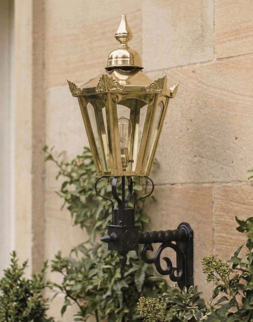Digital Illustration of the Medium Concordia Hexagonal Brass Lantern With Royale Bracket Mounted on Sandstone Brick Building Entrance Digital Illustration of the Medium Concordia Hexagonal Brass Lantern With Royale Bracket Mounted on Sandstone Brick Building Entrance