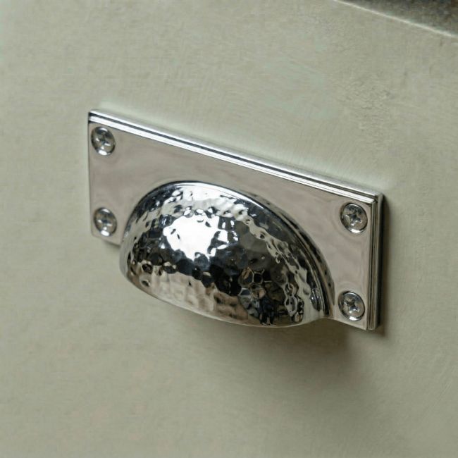 Digital Illustration of the Polished Chrome Rectangular Drawer Pull with Curved Hammered Handle Mounted on a Sage Green Cupboard Door Digital Illustration of the Polished Chrome Rectangular Drawer Pull with Curved Hammered Handle Mounted on a Sage Green Cupboard Door